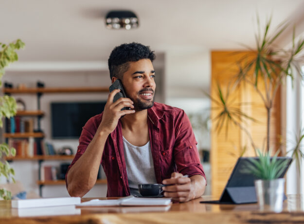 Adult man, making plans with his business partner.